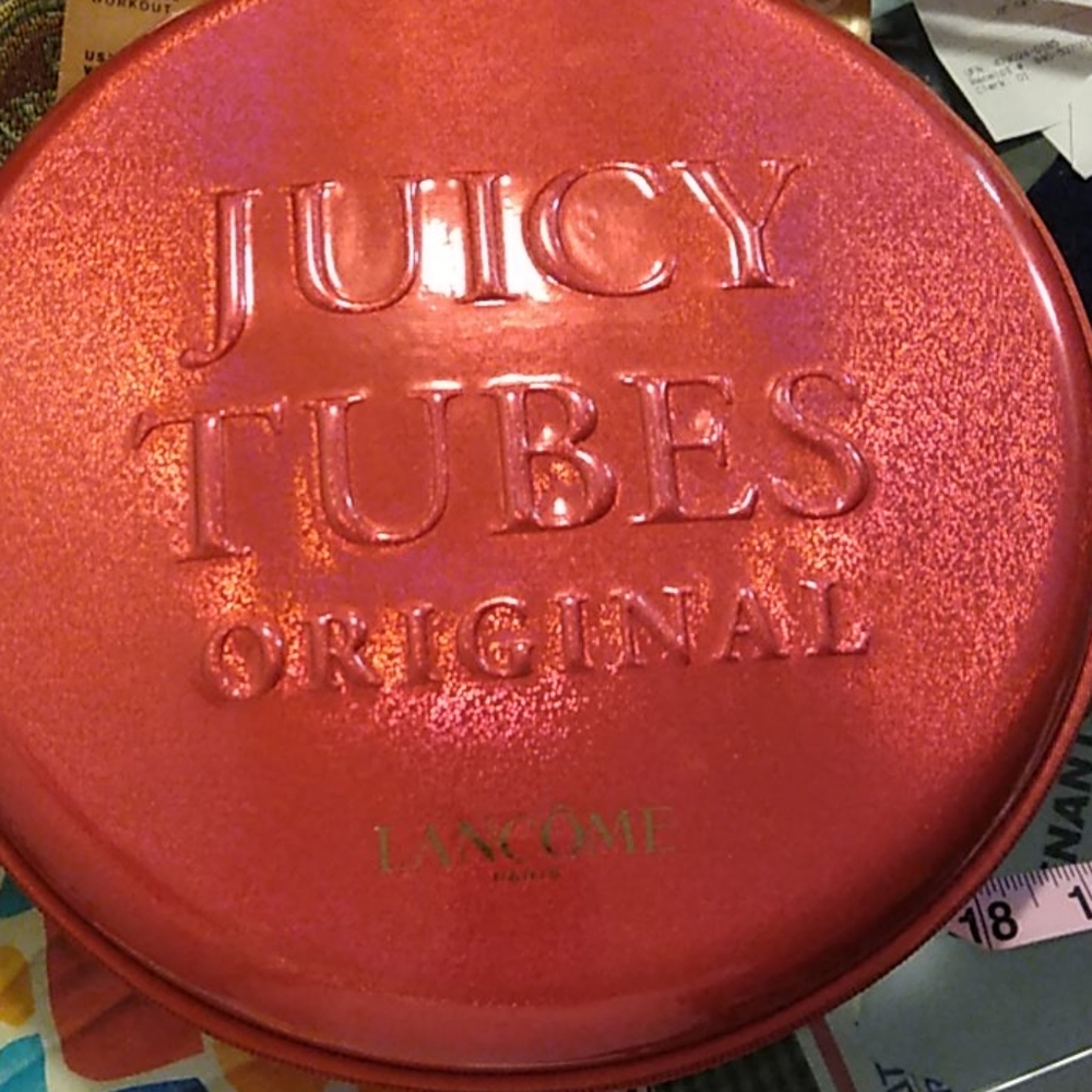 10 fullsize Lancome juicy tube carrying case.